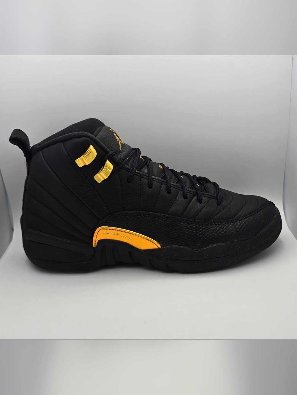 Air Jordan 12 Retro Black and University Gold